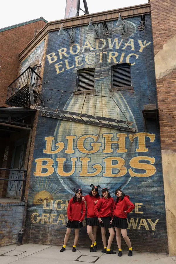 Girls at Broadway Electric Light Bulbs